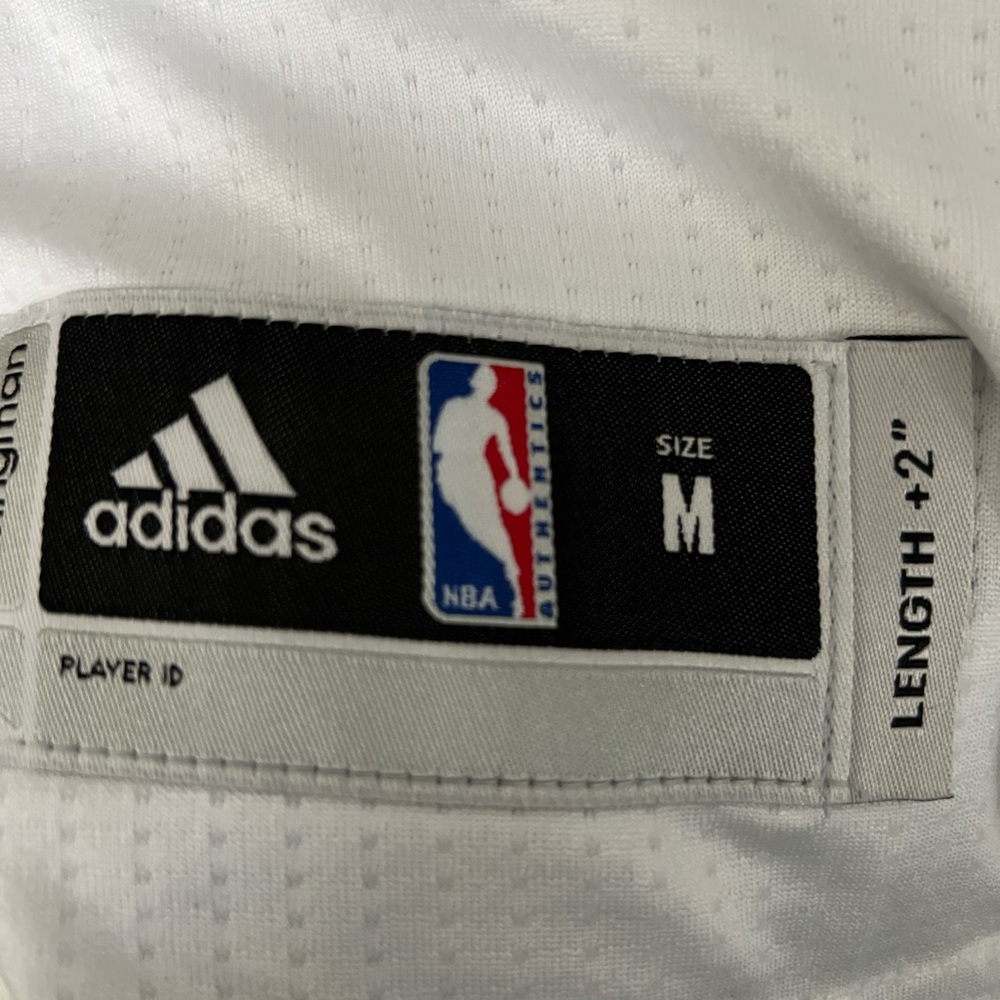 adidas Kids White Basketball Jersey with Orange and Blue Accents LENGHT +2” - Picture 3 of 3